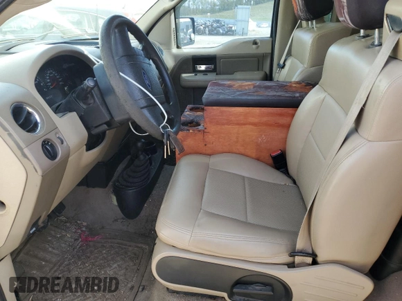 2006 Ford F-150 XL with VIN 1FTRF14W46NA81042, listed as a Copart auction lot 56927865 with 199,446 mi miles and Clean title. Bid and sale history available at DreamBid. Image 7.