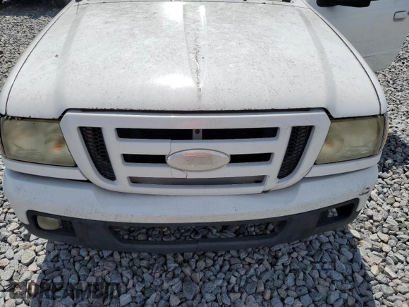 2006 Ford Ranger STX z VIN 1FTYR44U76PA03152, wystawiony jako Copart lot #57479265 z przebiegiem Nie podano mil oraz Czysty tytuł • Clean title. Historia ofert i sprzedaży dostępna na DreamBid. Obrazek 11.