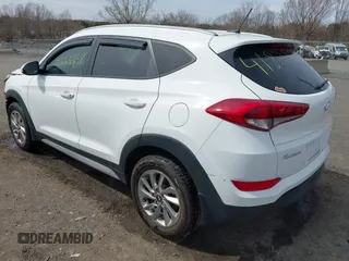 2017 Hyundai Tucson SE with VIN KM8J3CA44HU437644, listed as a IAAI auction lot 41825957 with 59,402 mi miles. Bid and sale history available at carsss.com. Image 3.