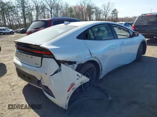 2023 Toyota Prius LE with VIN JTDACAAUXP3010983, listed as a IAAI auction lot 41912377 with 17,187 mi miles. Bid and sale history available at carsss.com. Image 4.