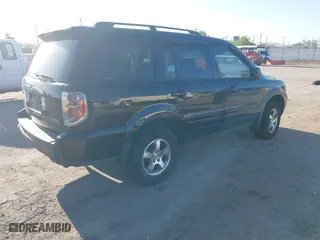 2006 Honda Pilot EX-L with VIN 2HKYF185X6H540975, listed as a IAAI auction lot 41992327 with 211,898 mi miles. Bid and sale history available at carsss.com. Image 4.