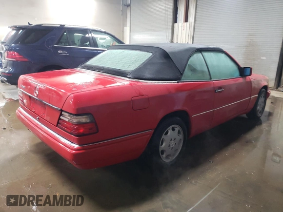 1994 Mercedes-Benz E 320 with VIN WDBEA66E8RC044069, listed as a Copart auction lot 87713565 with 69,061 mi miles and Salvage Title. Bid and sale history available at DreamBid. Image 3.