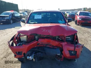 2014 Toyota Tacoma with VIN 3TMLU4EN5EM152759, listed as a IAAI auction lot 41726552 with 194,817 mi miles. Bid and sale history available at carsss.com. Image 12.