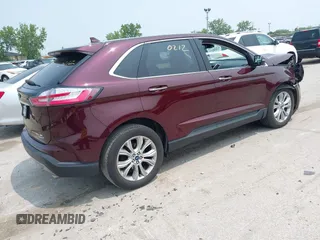 2019 Ford Edge Titanium with VIN 2FMPK4K96KBB20247, listed as a IAAI auction lot 42450212 with 121,756 mi miles and . Bid and sale history available at DreamBid. Image 4.