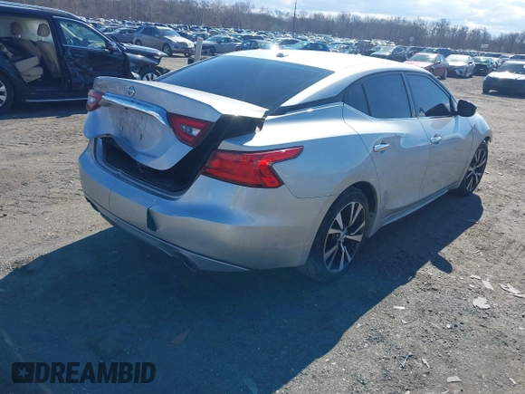 2016 Nissan Maxima SV z VIN 1N4AA6AP4GC446635, wystawiony jako IAAI lot #41672861 z przebiegiem 118 377 mil mil oraz . Historia ofert i sprzedaży dostępna na DreamBid. Obrazek 4.