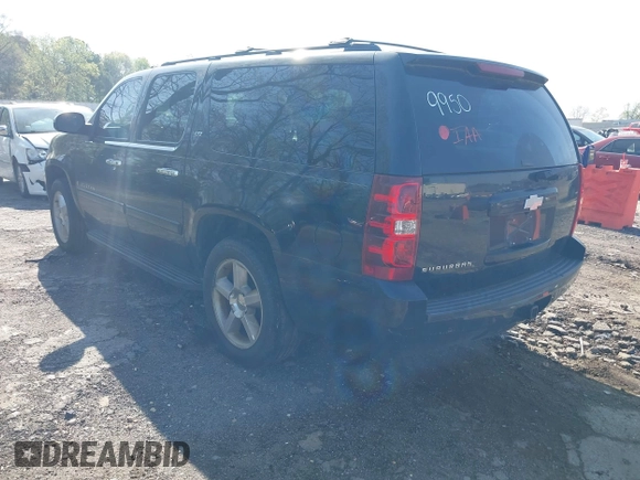 2007 Chevrolet Suburban LT with VIN 1GNFC16077R409950, listed as a IAAI auction lot 41882474 with 266,195 mi miles and . Bid and sale history available at DreamBid. Image 3.