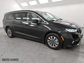 2023 Chrysler Pacifica Hybrid Touring L with VIN 2C4RC1L70PR631392, listed as a Copart auction lot 47396985 with 73,157 mi miles and Clean Title. Bid and sale history available at carsss.com. Image 4.