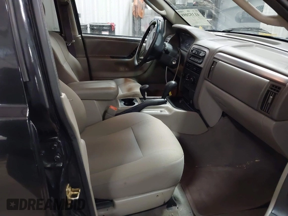2004 Jeep Grand Cherokee Laredo with VIN 1J4GW48N84C367215, listed as a IAAI auction lot 41352098 with 165,485 mi miles and . Bid and sale history available at DreamBid. Image 5.