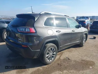 2020 Jeep Cherokee Latitude Plus with VIN 1C4PJLLB1LD623909, listed as a IAAI auction lot 41233277 with 134,889 mi miles. Bid and sale history available at carsss.com. Image 4.