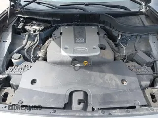 2014 Infiniti QX70 with VIN JN8CS1MU8EM450428, listed as a IAAI auction lot 42233727 with 88,342 mi miles and . Bid and sale history available at DreamBid. Image 10.