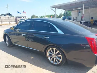 2013 Cadillac XTS Luxury z VIN 2G61P5S37D9110658, wystawiony jako IAAI lot #42196442 z przebiegiem 182 228 mil mil oraz . Historia ofert i sprzedaży dostępna na DreamBid. Obrazek 15.