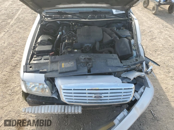 2011 Ford Crown Victoria LX z VIN 2FABP7EVXBX155506, wystawiony jako Copart lot #56899375 z przebiegiem 177 956 mil mil oraz Szkoda całkowita • Salvage title. Historia ofert i sprzedaży dostępna na DreamBid. Obrazek 11.