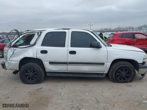 2004 Chevrolet Tahoe LT with VIN 1GNEC13Z74R313844, listed as a IAAI auction lot 41444672 with 233,620 mi miles. Bid and sale history available at carsss.com. Image 13.