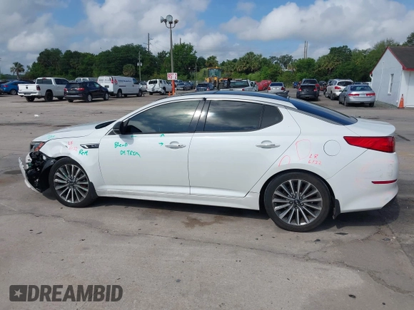 2015 Kia Optima SX Turbo with VIN 5XXGR4A60FG503940, listed as a IAAI auction lot 41944773 with 214,914 mi miles. Bid and sale history available at carsss.com. Image 14.