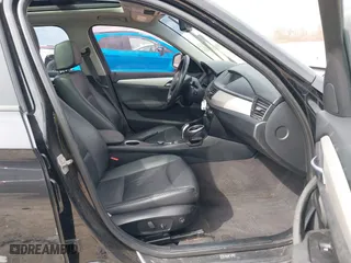 2013 BMW X1 xDrive28i with VIN WBAVL1C58DVR82070, listed as a IAAI auction lot 41849986 with 136,394 mi miles. Bid and sale history available at carsss.com. Image 5.
