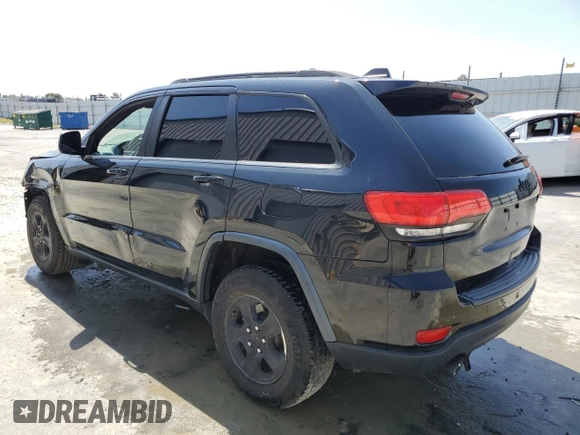 2017 Jeep Grand Cherokee Laredo with VIN 1C4RJEAG1HC813810, listed as a Copart auction lot 59703545 with 57,180 mi miles and Clean title. Bid and sale history available at DreamBid. Image 2.