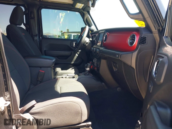 2023 Jeep Gladiator Rubicon z VIN 1C6JJTBG3PL531982, wystawiony jako IAAI lot #42211139 z przebiegiem 28 301 mil mil oraz . Historia ofert i sprzedaży dostępna na DreamBid. Obrazek 5.