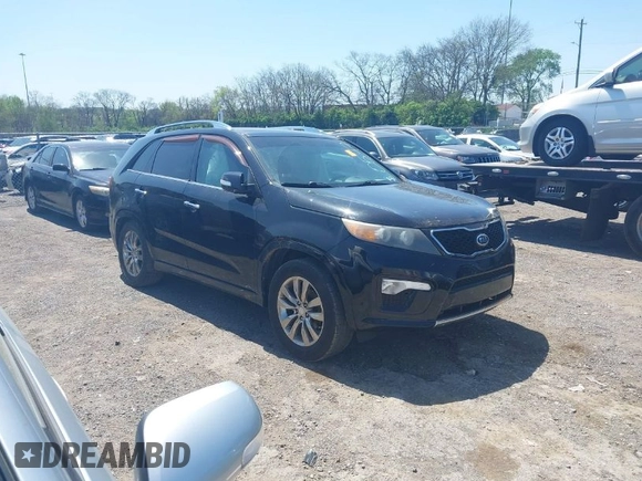2012 Kia Sorento SX with VIN 5XYKW4A23CG230547, listed as a IAAI auction lot 41961371 with 203,450 mi miles. Bid and sale history available at carsss.com. Image 1.