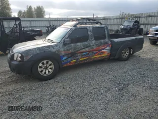 2002 Nissan Frontier SE with VIN 1N6ED29X92C345161, listed as a Copart auction lot 71686494 with 193,955 mi miles and Non repairable. Bid and sale history available at DreamBid. Image 1.