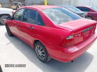 2005 Ford Focus S z VIN 1FAFP34N65W165817, wystawiony jako IAAI lot #42218809 z przebiegiem 191 324 mil mil oraz . Historia ofert i sprzedaży dostępna na DreamBid. Obrazek 3.