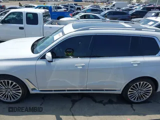 2019 BMW X7 xDrive50i z VIN 5UXCX4C54KLS38649, wystawiony jako IAAI lot #42435379 z przebiegiem 60 905 mil mil oraz . Historia ofert i sprzedaży dostępna na DreamBid. Obrazek 14.