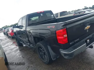 2016 Chevrolet Silverado 1500 LT with VIN 1GCVKREH3GZ233606, listed as a IAAI auction lot 42111728 with 90,449 mi miles and . Bid and sale history available at DreamBid. Image 3.