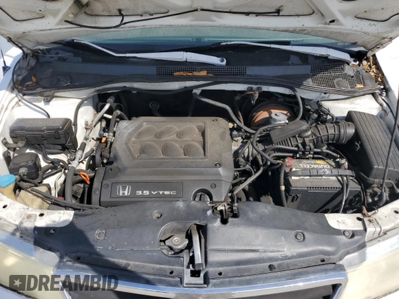 2001 Honda Odyssey EX z VIN 2HKRL18661H500391, wystawiony jako Copart lot #57249725 z przebiegiem 207 905 mil mil oraz Szkoda całkowita • Salvage title. Historia ofert i sprzedaży dostępna na DreamBid. Obrazek 12.
