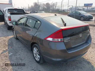 2010 Honda Insight EX with VIN JHMZE2H75AS027964, listed as a IAAI auction lot 41889301 with 136,485 mi miles and . Bid and sale history available at DreamBid. Image 3.