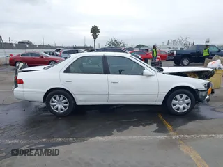 2001 Toyota Camry CE with VIN JT2BG22K110603452, listed as a IAAI auction lot 41731258 with 117,142 mi miles. Bid and sale history available at carsss.com. Image 13.