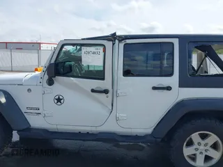 2018 Jeep Wrangler Unlimited Sport S with VIN 1C4BJWDG3JL810853, listed as a IAAI auction lot 42074032 with 141,942 mi miles and . Bid and sale history available at DreamBid. Image 14.