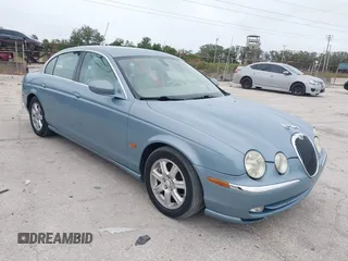 2004 Jaguar S-Type with VIN SAJEA01T44FN03885, listed as a IAAI auction lot 41363610 with 260,228 mi miles and . Bid and sale history available at DreamBid. Image 1.