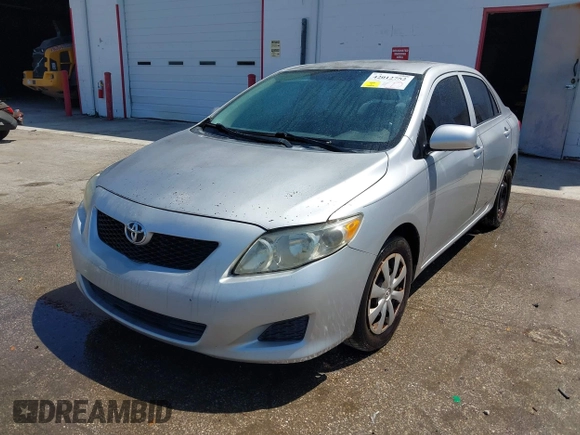 2010 Toyota Corolla with VIN 1NXBU4EE3AZ250198, listed as a IAAI auction lot 42012752 with 175,636 mi miles and . Bid and sale history available at DreamBid. Image 2.