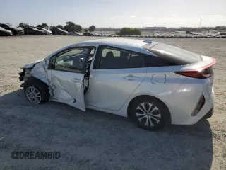 2021 Toyota Prius LE with VIN JTDKAMFP2M3173895, listed as a Copart auction lot 54384825 with 72,915 mi miles and Salvage Title. Bid and sale history available at DreamBid. Image 2.