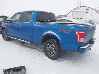 2015 Ford F-150 XLT w/HD Payload Pkg with VIN 1FTFW1EGXFKE05722, listed as a IAAI auction lot 41575776 with 1 mi miles. Bid and sale history available at carsss.com. Image 3.