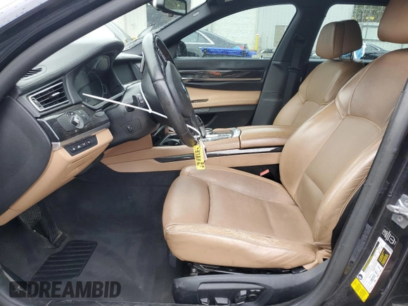 2014 BMW 7 Series 740Li with VIN WBAYE4C56ED138285, listed as a Copart auction lot 84256374 with 88,258 mi miles and Salvage Title. Bid and sale history available at carsss.com. Image 7.