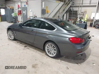 2014 BMW 4 Series 428i xDrive with VIN WBA3N9C56EF721564, listed as a IAAI auction lot 41737409 with 42,052 mi miles and . Bid and sale history available at DreamBid. Image 3.