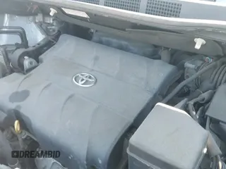 2014 Toyota Sienna LE z VIN 5TDJK3DC7ES075190, wystawiony jako IAAI lot #42240347 z przebiegiem 146 963 mil mil oraz . Historia ofert i sprzedaży dostępna na DreamBid. Obrazek 19.