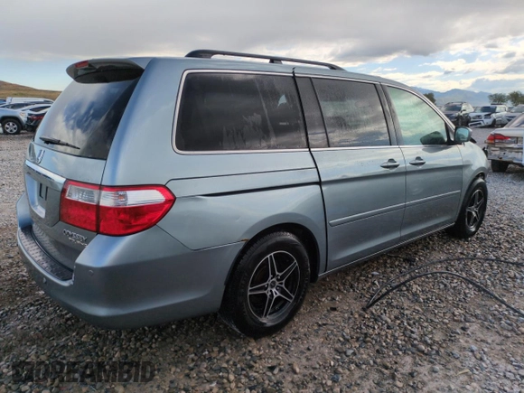 2005 Honda Odyssey Touring z VIN 5FNRL38855B051447, wystawiony jako Copart lot #57144925 z przebiegiem 186 476 mil mil oraz Szkoda całkowita • Salvage title. Historia ofert i sprzedaży dostępna na DreamBid. Obrazek 3.