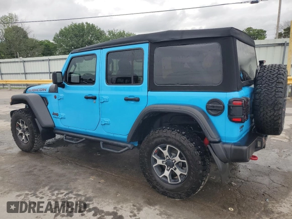 2021 Jeep Wrangler Unlimited Rubicon with VIN 1C4JJXFM4MW617635, listed as a Copart auction lot 58956205 with 52,995 mi miles and Salvage title. Bid and sale history available at DreamBid. Image 2.