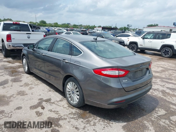 2013 Ford Fusion SE Hybrid with VIN 3FA6P0LU9DR247484, listed as a IAAI auction lot 42110685 with 202,531 mi miles. Bid and sale history available at carsss.com. Image 3.