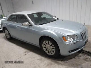 2013 Chrysler 300 with VIN 2C3CCAKG0DH604318, listed as a IAAI auction lot 41531406 with 51,765 mi miles. Bid and sale history available at carsss.com. Image 1.