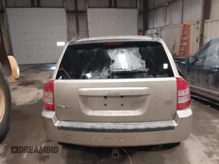 2010 Jeep Compass Sport with VIN 1J4NF4FB7AD501587, listed as a IAAI auction lot 41514419 with 154,826 mi miles. Bid and sale history available at carsss.com. Image 16.