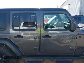 2022 Jeep Wrangler Unlimited Sport S with VIN 1C4HJXDG5NW105931, listed as a IAAI auction lot 42349628 with 37,314 mi miles and . Bid and sale history available at DreamBid. Image 14.