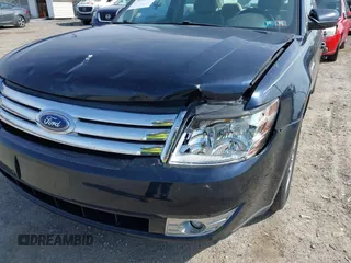 2008 Ford Taurus SEL with VIN 1FAHP24W48G131630, listed as a IAAI auction lot 42042813 with 86,855 mi miles. Bid and sale history available at carsss.com. Image 6.
