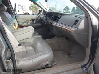 1998 Mercury Grand Marquis LS with VIN 2MEFM75W8WX687967, listed as a IAAI auction lot 41626058 with 135,183 mi miles. Bid and sale history available at carsss.com. Image 5.