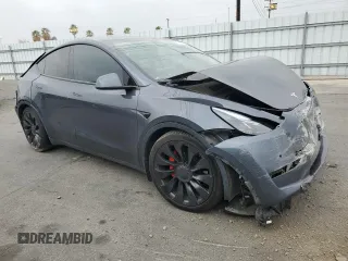 2022 Tesla Model Y Performance z VIN 7SAYGDEF1NF457494, wystawiony jako Copart lot #43287315 z przebiegiem 79 855 mil mil oraz Szkoda całkowita • Salvage title. Historia ofert i sprzedaży dostępna na DreamBid. Obrazek 4.