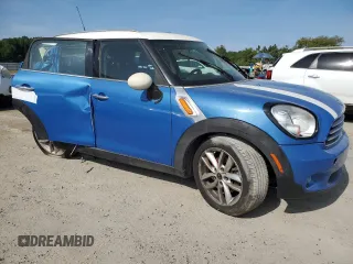 2012 MINI Countryman with VIN WMWZB3C57CWM06544, listed as a Copart auction lot 55838805 with 150,048 mi miles and Salvage Title. Bid and sale history available at DreamBid. Image 4.