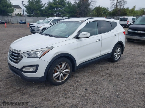 2013 Hyundai Santa Fe 2.0T Sport with VIN 5XYZUDLA8DG079795, listed as a IAAI auction lot 42035743 with 170,321 mi miles. Bid and sale history available at carsss.com. Image 2.