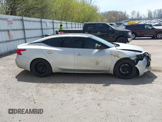 2016 Nissan Maxima SV z VIN 1N4AA6APXGC383279, wystawiony jako IAAI lot #42144003 z przebiegiem 141 099 mil mil oraz . Historia ofert i sprzedaży dostępna na DreamBid. Obrazek 13.
