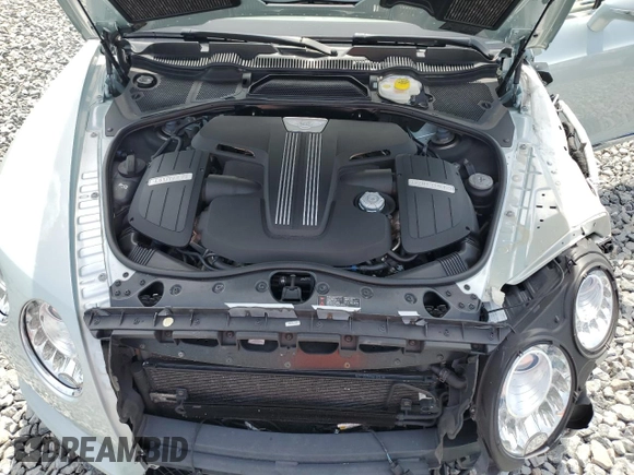 2013 Bentley Continental GT z VIN SCBGT3ZA8DC082988, wystawiony jako Copart lot #57662215 z przebiegiem 35 194 mil mil oraz Szkody całkowita. Historia ofert i sprzedaży dostępna na DreamBid. Obrazek 11.